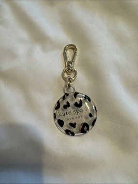 kate spade Leopard Print Clear Acrylic Apple AirTag clip with Gold Hardware